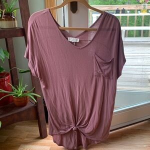 Dusty rose pink short sleeve with v-neck, pocket on front, and knot, v-neck back